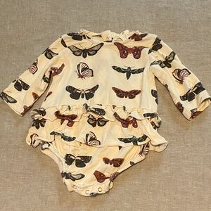 Kate Quinn butterfly ruffled onsie